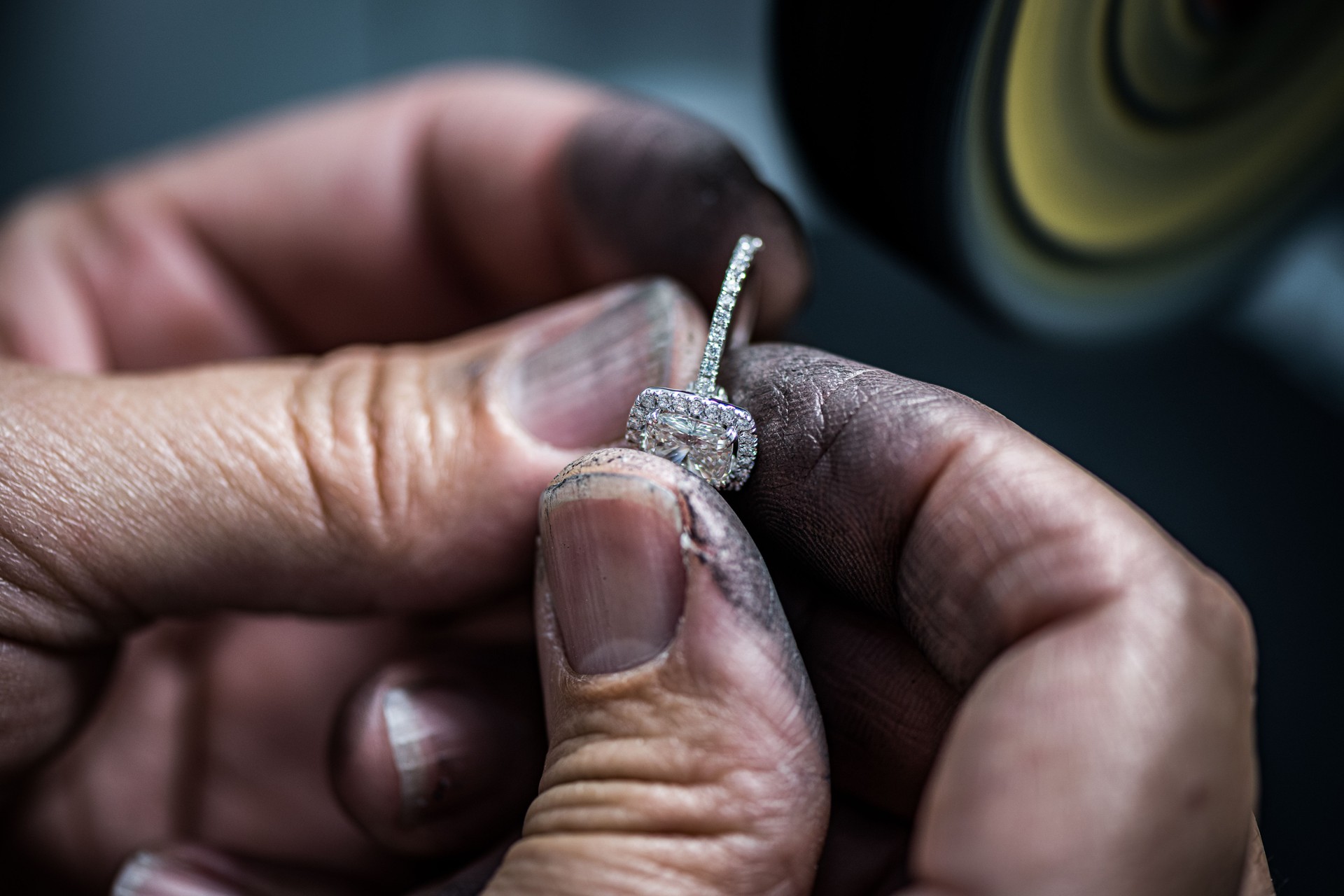 Crafting Elegance: A Skilled Hand Creating a Beautiful Jewel